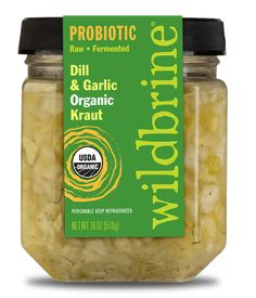 a jar of dill and garlic kraut with the label probiotic now