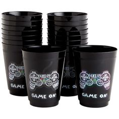 a stack of black cups sitting next to each other