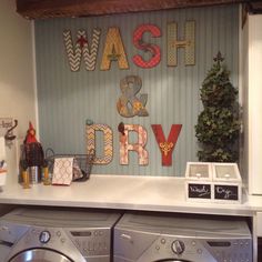 a washer and dryer sitting on top of a counter