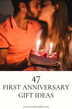 a man and woman kissing in front of a cake with lit candles on it that says, 47 first anniversary gift ideas