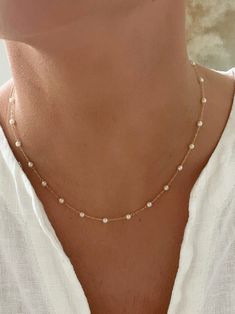 Elegant Beaded Necklace With Delicate Chain, Dainty White Single Strand Chain Necklace, Delicate Charm Necklaces For Parties, Dainty Single Strand Beaded Necklaces For Wedding, Dainty Single Strand White Chain Necklace, Dainty Single Strand Beaded Necklace For Wedding, Dainty Bridal Necklace With Pearl Chain For Party, Dainty Pearl White Necklace, Feminine Wedding Clavicle Chain Necklace