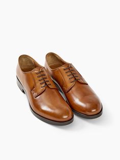 The GABU Lace-up Derby represents a return to dressing well with this perfectly crafted, classic lace-up Derby style. Versatile and long-wearing, GABU is artfully crafted from premium Italian calf leather with my brand signature heel detail. I've enforced the vamp to ensure these will stand up to my life (and yours). Crafted in Italy by traditional artisans, this lace-up classic offers ultimate comfort in a grained finish. DETAILS + Men’s + Italian Calf Leather+ Signature heel detail + Generousl Calf Leather Lace-up Oxfords For Derby, Brown Lace-up Derby With Brogue Detailing, Calf Leather Lace-up Shoes For Derby With Stitched Sole, Designer Calf Leather Lace-up Derby Shoes, Brown Leather Sole Lace-up Shoes For Derby, Dressing Well, Pieces Men, Unisex Shoes, Boot Shop