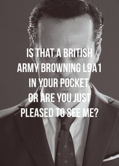 a man wearing a suit and tie with the words is that a british army browning l4a1 in your pocket or are you just pleased to see me?