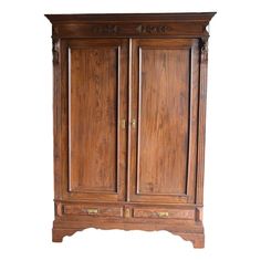 an old wooden armoire with carvings on the front and bottom panel, against a white background