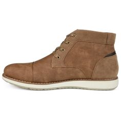 A casual but always high-minded look, the Chukka boot. The Austin features premium faux leather uppers cleverly contrasted with embossed accents on either side. A lace-up closure, cap toe, cushioned footbed, and durable rubber outsole complete this charming look by Vance Co. With a classic easy style like this in your rotation, you're certain to find yourself wearing them on repeat. Rugged Style, Closed Toe Shoes, Chukka Boot, Easy Style, Rounded Toe Boots, Round Toe Heels, Mens Shoes Boots, Journee Collection, On Repeat