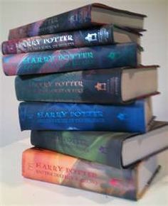 a stack of harry potter books sitting on top of each other