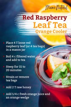 a red raspberry leaf tea drink with oranges and mint on the side