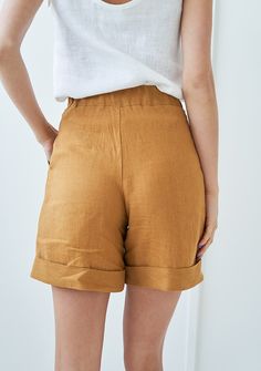 "No better way to fully appreciate the summer than wearing our ASPEN shorts. 90's inspired timeless silhouette, high waist and women's beloved, handy front pockets. FABRIC: 100% softened Lithuanian linen COLOR: Please choose a color on the side menu. STYLE: Softened linen high waist shorts with hem detail and front pockets. Inseam length is around 6 inches ( 15.5 cm). SIZE CHART: XS Bust 28- 31\" (72- 80 cm) Waist 20- 22.5\" (51- 58 cm) Hips 31.5 -34.5\" (80- 87 cm) S Bust 31.5- 35\" (80- 88 cm) Brown Bermuda Bottoms For Summer, Summer Brown Bermuda Bottoms, Relaxed Fit Bermuda Shorts With Rolled Hem, High-waisted Shorts With Rolled Hem For Summer, Summer High-waisted Shorts With Rolled Hem, Relaxed Fit Shorts With Rolled Hem, High-waisted Brown Shorts For Summer, Linen Color, High Waist Shorts