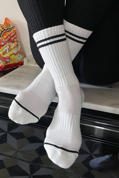 Le Bon Shoppe Boyfriend socks in classic white with black stripes. Stay fly all year long in these calf length sports socks. Pair with sneakers or sliders. Perfect for work from home. One size fits most. 85% cotton, 13% polyester, 2% spandex. Fair trade made in Korea. PIPE AND ROW Boyfriend Socks, The Boyfriend, Sports Socks, Men Fashion Casual Outfits, Closet Staples, White Sock, Sport Socks, Cropped Trousers, Cool Socks