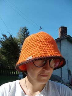 Crocheted winter woman bucket hat, made with soft yarn 25 % wool and 75% acrylic. Orange hat  with brown periphery. Soft hat, great gift for you or for girlfriend. Size : US 6 7/8 - 7 ; S - M Head diameter 54 -56 cm. Free shipping on orders $35 and up to US buyers Winter Bucket Hat, Orange Hat, Orange Hats, Soft Hats, Crochet Bucket Hat, Brown Hats, Crochet Winter, Pink Box, Bucket Hats