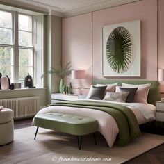 a bedroom with pink walls and green accents