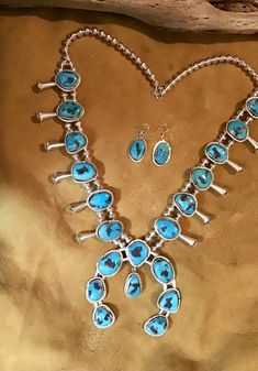 Western Style Turquoise Dangle Jewelry, Southwestern Blue Jewelry For Western-themed Events, Western Blue Jewelry For Western-themed Events, Handmade Turquoise Jewelry For Western-themed Events, Blue Concho Jewelry For Western-themed Events, Southwestern Style Blue Concho Jewelry, Blue Southwestern Jewelry With Concho, Southwestern Turquoise Necklace For Western-themed Events, Southwestern Blue Concho Jewelry