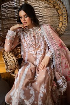 Light Peach Lawn Kameez Salwar Pakistani Party Wear comes in an Embellished Center Panel, Side Panels, Embroidered Sleeves, Embroidered Sleeves Border, Lace Neckline, Lace Patches for Slits, and Lace Borders. It is paired with Embroidered Net Dupatta, Embroidered Dupatta Length Border, and Embroidered Dupatta Pallu Border, it has Plain Dyed Back, paired with Plain Dyed Trouser Detailed Description: SKU: PN227 Detailing: Embroidery, Threads, Floral designs Color: Light Peach Fabric: Lawn Design: Summer/fall Outfits, Dupatta Top, Side Border, Sobia Nazir, Printed Organza, Lawn Design, Clothing Studio, Pakistani Party Wear, Lawn Dress