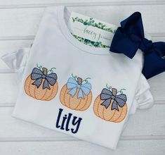 This embroidered pumpkin shirt with bows is the perfect shirt for your little one to wear to Thanksgiving, the pumpkin patch, or just for everyday fall wear. The brother match can be found here: www.etsy.com/listing/1093672712/boys-fall-shirt-embroidered-pumpkin?ref=shop_home_active_1&frs=1 Shirts are short or long sleeved and made from 100% cotton high quality soft cotton with a ruffled bottom. Size chart can be found in the listing's photos. Shirt brand will vary based on availability at the t Cute Fitted Shirt For Fall, Embroidered Pumpkin, Toddler Fall, Fall Wear, Pumpkin Shirt, Fall Shirt, Thanksgiving Shirts, Fall Design, Boutique Brands