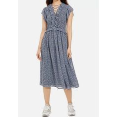 Michael Kors Keeps You Flowing And Full Of Flounce In This Ruffe-Neck Printed Dress With A Lace-Up Detail That Ups The Style Ante.. Approx. 37 Long|V-Neck; A-Line Shift|Ruffled Neck With Lace-Up Detail|Polyester|Dry Clean|Imported Blue V-neck Midi Dress With Ditsy Floral Print, Blue V-neck Viscose Midi Dress, Blue Viscose V-neck Midi Dress, Michael Kors Fitted Dresses For Spring, Fitted Michael Kors Dress For Spring, Michael Kors Fitted Spring Dresses, Casual Fitted Michael Kors Dress, Michael Kors Fitted Casual Dress, Casual Summer Michael Kors Dresses