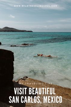 a person swimming in the ocean with text overlay reading my traveling tips visit beautiful san carlo, mexico