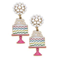 Celebrate in style with our Birthday Cake Enamel Earrings in White. These earrings are the perfect accessory for any birthday outfit, adding a touch of sweetness to your look. They are durable and will make the perfect gift for yourself or a loved one. White Enamel Jewelry For Party, Cute Drop Earrings For Birthday, Sweet Drop Earrings For Party, Sweet Style Drop Earrings For Party, Cute White Party Earrings, Cute White Earrings For Party, Fun White Party Jewelry, Sweet White Earrings For Birthday, Playful White Jewelry For Birthday