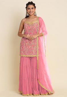 Faux Georgette Pakistani Suit in Pink This Unstitched attire with Poly Shantoon Lining is Enhanced with Resham, Zari and Sequins Work Available with a Faux Georgette Sharara in Pink and a Net Dupatta in Pink Do note: Accessories shown in the image are for presentation purposes only.(Slight variation in actual color vs. image is possible). Pink Sharara Suit, Sharara Style, Pink Sharara, Kids Kaftan, Georgette Sharara, Designer Salwar Kameez, Modest Evening Dress, Indian Salwar Kameez, Georgette Tops