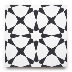 a black and white pattern on a square tile