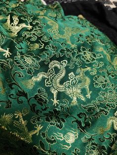 Brocade fabric with Chinese Loong pattern, jacquard fabric Width:29.5inches/75cm Color:dark green Material:polyester. Thank you for coming to my shop! (^ - ^) Green And Gold Dragon, Luxury Green Embroidered Fabric For Festive Season, Green Chinese Dragon, Copper Autumn, Shopify Sales, Chinese Gold, Chinese Fabric, Chinese Green, Dark Green Color