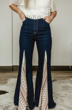 Unleash your wanderlust with our Mix Media Lace Detail Wide Leg Jeans. These unique jeans feature an asymmetrical front zipper fly, contrast lace detailing, and functional front pockets with a 34 inch inseam. Get ready to make a statement while staying comfortable in these quirky and stylish flare jeans! Blue Bohemian Wide Leg Flare Jeans, High Rise Blue Patchwork Flare Jeans, Lace Bell Bottoms, Embroidered Wide Leg Denim Flare Jeans, Denim Blue Patchwork Wide-leg Flare Jeans, Bell Bottoms Jeans, Bohemian Blue Wide-leg Flare Jeans, Oc Things, Unique Jeans