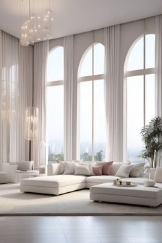 a living room filled with lots of white furniture next to large window covered in curtains