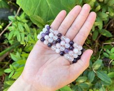 Amethyst Clear Quartz And Rose Quartz Combo is a harmonious symphony of crystal energies. With its combination of amethyst, clear quartz, and rose quartz beads, it becomes a wearable embodiment of balance and affection. It's not just an accessory; it's a reminder to align your energies and amplify your intentions. Highlights: Handmade item Bracelet length: 7.5 Inches Materials: Crystal Gemstone: Amethyst Spiritual Rose Quartz Crystals With Natural Stones, Spiritual Rose Quartz Crystals, Rose Quartz Gemstone Bracelet For Meditation, Rose Quartz Beads, Quartz Beads, Energy Crystals, Crystals And Gemstones, Clear Quartz, Rose Quartz