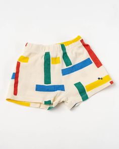 Bobo Choses Kids Multicolor Beacons Shorts. Bobo Choses is a sustainable children’s clothing brand that celebrates kids for their creativity, their spunk, and hopes to inspire kids and adults alike to be funny and lighthearted. At Jake and Jones, a Santa Barbara boutique for slow fashion. Playful Graphic Print Beach Bottoms, Playful Shorts For Summer Playtime, Playful Summer Shorts For Playtime, Playful Shorts For Playtime In Summer, Playful Summer Playtime Shorts, Playful Cotton Shorts For Summer, Playful White Cotton Pajama Shorts, Playful Green Cotton Shorts, Playful Cotton Pajama Shorts With Built-in Shorts