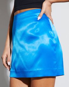 The Macie Satin Mini Skirt makes every outfit better. Crafted from smooth and shiny satin fabric, this mini skirt features a fitted waistband, side zipper closure, and lining for comfortable wear all day or night long. High rise Fitted waist Mini length Satin fabric Side zipper closure Shell: 95% Polyester 5% Spandex, Lining: 100% Polyester Mini Blue Skirt, Satin Mini Skirt, Skirt Fits, Blue Skirt, Trending Now, Jeans Shorts, Satin Fabric, Side Zipper, Mini Skirt