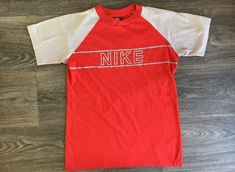 Nike Jersey Shirt 80s Vintage Blue Tag Raglan Red Grey Block | Etsy Nike Tshirts, Budweiser Shirt, Nike Gear, Jersey Nike, Nike Jersey, 90s Shirts, Nike Vintage, Nike Sweater, Nike Tshirt