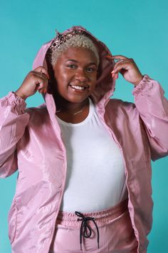 The Tiera windbreaker is so comfortable and is great for windy days when you're trying to stay warm but still look cute. You can pair it with the matching Tiera windbreaker pants or any of your favorite outfits. Curvy Windbreaker Jacket with hood and zip front. Comes in rust and mauve. This jacket comes in sizes 1X, 2X, and 3X Fabric: 100% polyester Care Instructions: Hand wash cold, do not bleach, lay flat to dry, cool iron if needed Model is 5'1" wearing a 2X Casual Pink Nylon Windbreaker, Purple Nylon Casual Windbreaker, Pink Sporty Windproof Windbreaker, Retro Pink Hooded Windbreaker, Purple Nylon Long Sleeve Windbreaker, Windy Day, Windbreaker Jacket, Hooded Jacket, Bleach