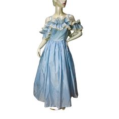 This 80s formal gown reminds me of a southern belle dress or Little Bo peep. It's made of a baby blue and white striped fabric that feels like nylon or polyester. It's lightweight.  The bodice is lined and boned in the front and on the sides. There is a white nylon zipper up the back.  There are two shoulder straps and a double layered ruffle that is attached in front and back but open on the sides so it can fall over the shoulders gracefully.  If you would like it a little higher or tighter it can be fixed fairly easily by pulling the threads tighter and securing with a few stitches.  There is a one-layer net crinoline sewn to the lining. There are no labels present.  Good condition but there are belt loops and the belt is missing. Measurements Bust 36" Waist 27" Lenght 48.5" from under a Vintage Off-shoulder Dress With Ruffles, Spring Victorian Dress For Party, Spring Vintage Dress With Ruffles For Formal Occasions, Spring Formal Vintage Dress With Ruffles, Summer Formal Vintage Ruffled Dress, Fitted Victorian Dress For Spring Evening, 80s Formal, Southern Belle Dress, Vintage Runway