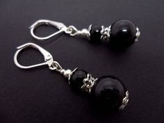 A pair of pretty hand made tibetan silver & black onyx bead dangly leverback hook earrings. new. Elegant Nickel-free Jewelry With Round Beads, Gothic Black Hypoallergenic Earrings, Black Hypoallergenic Sterling Silver Jewelry, Handmade Black Dangle Earrings, Handmade Black Round Beads Jewelry, Handmade Round Bead Earrings For Formal Occasions, Elegant Black Round Bead Earrings, Handmade Black Gothic Earrings, Gothic Dangle Jewelry With Lobster Clasp