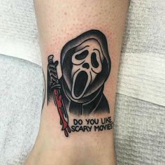 a person with a scary mask on their leg and a knife in his hand that says do you like scary movies?