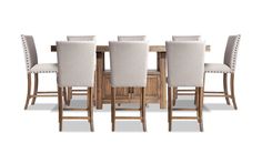 a set of six chairs and a table with white upholstered backrests