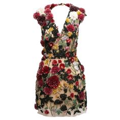 Red and multicolor floral beaded mini dress by Oscar de la Renta. Circa 2023. V-neckline. Cap sleeves. Open back. Back zip closure. 30" bust, 28" waist, 36.5" length, 17" shoulder width. Flower Embroidery Dress, Fancy Gown, Beaded Mini Dress, Fancy Gowns, Back Back, Oscar Dresses, Embellished Gown, Black Sleeveless Dress, Embroidery Dress