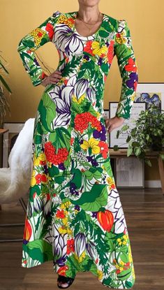 Incredible 1970's hand made long dress, with bright floral design with a Gucci vibe. This dress is meant for FUN!! Parties, weddings, vacations or just a day out, you will definitely turn some heads in this! Scoop neck, long sleeves and ties in the back to accent your waist. Very flattering on and super comfortable. Spring Retro Print Maxi Dress, Spring Maxi Dress With Retro Print, Multicolor Retro Print Maxi Dress For Spring, Retro Multicolor Maxi Dress For Spring, Retro Multicolor Printed Maxi Dress, Vibrant Green Floral Print Maxi Dress, Retro Multicolor Maxi Dress With Vibrant Print, 1970s Style Floral Print Dress For Garden Party, Vintage Green Spring Maxi Dress