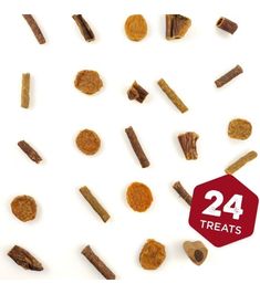 dog treats are arranged on a white surface with the number 24 in front of them