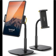 an image of a cell phone holder on a stand with the same device attached to it