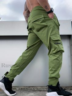 Russoo - Mens Casual Drawstring Cargo Pants with Unique Multi-Flap Pockets: Versatile Apparel for Autumn and Summer Outdoor Hip-Hop Style Green Joggers With Pockets For Outdoor Activities, Green Cargo Pocket Joggers For Outdoor, Green Joggers With Side Pockets For Outdoor, Green Outdoor Joggers With Side Pockets, Green Stretch Parachute Pants For Outdoor, Stretch Green Cargo Pants For Outdoor Activities, Green Stretch Cargo Pants For Outdoor Activities, Green Stretch Cargo Pants For Outdoor, Green Cotton Cargo Pants For Sports