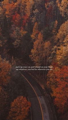 an aerial view of a road surrounded by trees with the words, pick up your car, get a hand on your heart