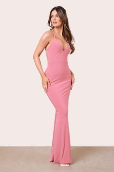 Elevate your look with our ''Guest List'' maxi dress. Designed with premium jersey stretch fabric. this dress will enhance your silhouette showing off your endless curves and the backless design and bum knot detailing will show off all your best assets. Tease your bronzed skin with a plunging neckline and a statement fishtail skirt that creates the perfect hourglass figure. Get ready to amaze everyone at your next event this season!Features- Sweetheart neckline- Cami straps- Backless knot detail Floor-length Backless Dress With Tie Back, Sleeveless Maxi Dress With Cutout Back For Gala, Fitted Long Backless Dress With Tie Back, Stretch Maxi Dress With Ruched Back, Maxi Length Dress With Ruched Back, Backless Maxi Dress With Keyhole Back For Night Out, Fitted Backless Mermaid Dress, Party Maxi Dress With Ruched And Low Back, Elastane Tie-back Dress For Night Out