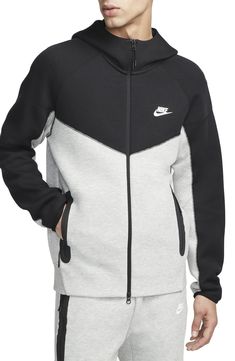 Lightweight Tech Fleece brings softness and warmth without added bulk to a layerable hoodie with zippered pockets for warming hands or holding essentials. 26" length (size Medium) Two-way front-zip closure Fixed hood Ribbed cuffs Front zip pockets 53% cotton, 47% polyester Machine wash, tumble dry Imported Nike Tech Jacket, Nike Tech Fleece Hoodie, Tech Fleece Hoodie, Nike Sportswear Tech Fleece, Windrunner Jacket, Weather Tech, Philippe Model, Nike Tech Fleece, Hooded Sweatshirt Men