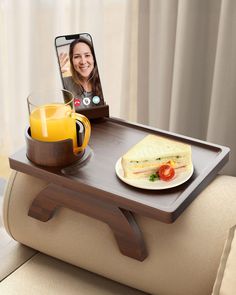 a tray with food and a cell phone on it