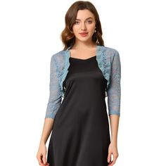 The ruffle collar, sheer floral lace fabric, and crop length give a unique, elegant touch. This cardigan shrug is perfect for layering over your favorite dresses or tops. It adds the right amount of coverage without taking away from the overall style of your outfit. If you're looking for a versatile and stylish piece to add to your wardrobe, the Women's Elegant Ruffle Collar Crop Cardigan Sheer Floral Lace Shrug Top is the perfect choice. It's a timeless piece that you can wear season after seas Crop Shrug, Cape Sweater Ponchos, Short Sleeve Bolero, Shrug Top, Cardigan Shrug, Cropped Shrug, Lace Shrug, Lace Bolero, Bolero Shrug