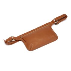 Manufactured with expert craftsmanship. Fits comfortably over the waist. Made of genuine leather with pebble effect Front and rear zipper closure Gold hardware Measures 7.5X5X1, 43" adjustable waist s Leather Waist Pack, Waist Bags For Women, Hip Purse, Leather Bag Pattern, Leather Waist Bag, Fanny Bag, Bag Belt, Electronics Jewelry