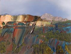 the mountains are covered in multicolored rocks