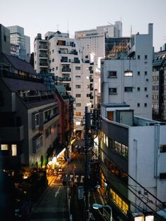 an aerial view of the city at dusk