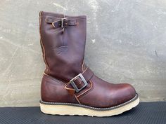 Rare USA MADE Red Wing Engineer 2970 PullOn Boots Brown Leather Mens 7 D Harness Awesome Shoes minor scuffs, see photos for a better visual description. PLEASE VIEW ALL PHOTOS CAREFULLY AS I CONSIDER THEM PART OF THE DESCRIPTION. I WILL GLADLY COMBINE SHIPPING FOR MULTIPLE ITEMS PURCHASED IF THEY CAN BE SAFELY SHIPPED TOGETHER. DELIVERY WITHIN 5 BUSINESS DAYS, 1-2 BUSINESS DAY HANDLING. ONCE YOUR PAYMENT CLEARS, THIS ITEM WILL COME PROFESSIONALLY PACKAGED AND SHIPPED WITH CARE. PLEASE CONTACT ME THROUGH MESSAGES IF YOU HAVE ANY QUESTIONS OR CONCERNS. THANKS FOR LOOKING Red Wing Engineer Boots, Engineer Boots Men, Redwing Boots, Shoes Boots Combat, Boots Men Outfit, Red Wing Boots, Engineer Boots, Awesome Shoes, Boots Style