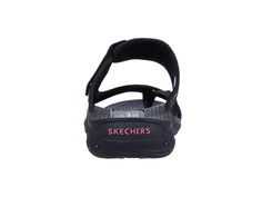 Have some fun with your warm-weather look in the colorful SKECHERS® Reggae - Mad Swag sandal..Nylon fabric upper features a woven finish and multi-color textile panel..Slip-on construction..Open-toe silhouette with toe ring detail..Strap over instep with adjustable hook-and-loop closure for a secure fit..Breathable fabric strap lining..Contoured footbed flaunts arch support and toe ridge for added comfort..Flexible rubber traction outsole..Imported..Product measurements were taken using size 8, Black Nylon Sandals, Casual Multicolor Sport Sandals With Removable Insole, Casual Multicolor Synthetic Sport Sandals, Casual Nylon Sport Sandals With Adjustable Straps, Black Textile Sandals For The Beach, Skechers Shoes Women, Fabric Strap, Toe Ring, Nylon Fabric